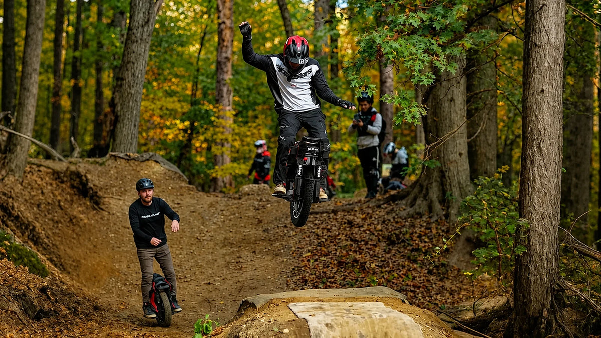 KingSong F18 race rider controlling the wheel through rough terrain